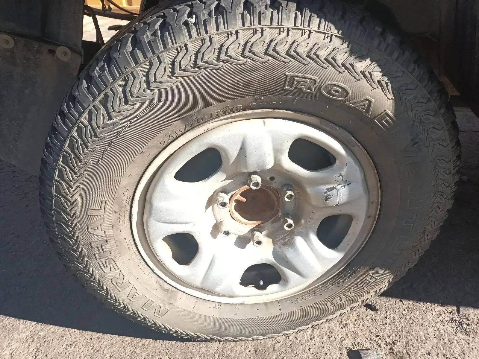 Close-up of a Dusty Tyre and Wheel on an Off-road Vehicle — South West 4WD Wreckers In Brisbane, QLD