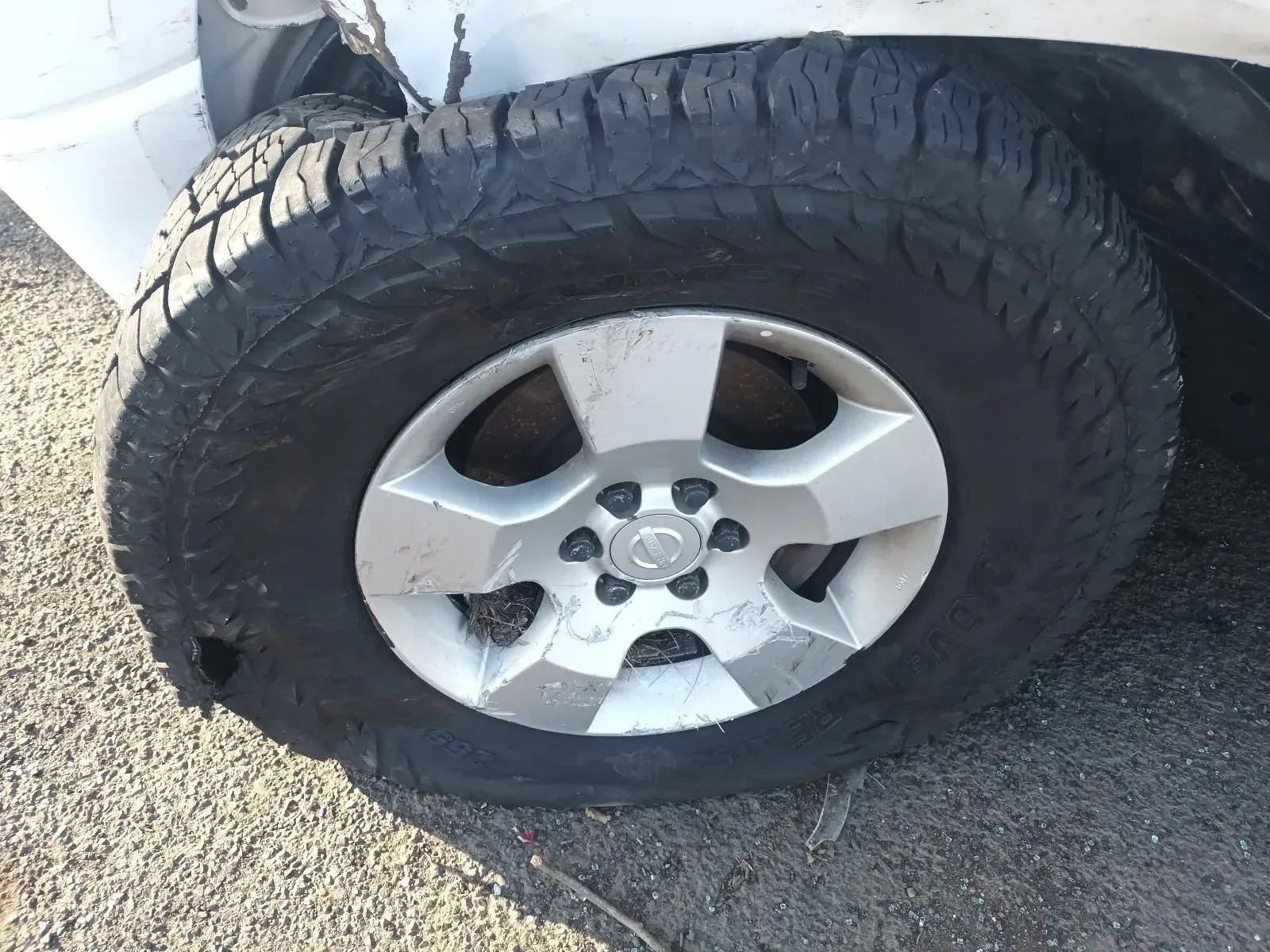 Flattened Tyre on a White Vehicle — South West 4WD Wreckers In Brisbane, QLD