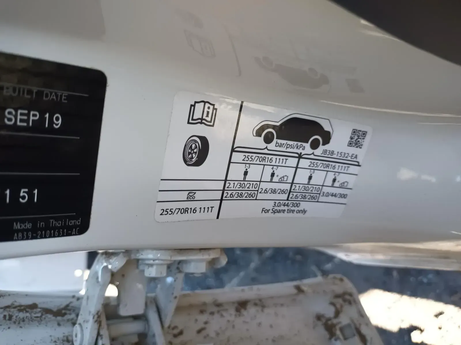Tyre Pressure Sticker on a White Vehicle — South West 4WD Wreckers In Brisbane, QLD