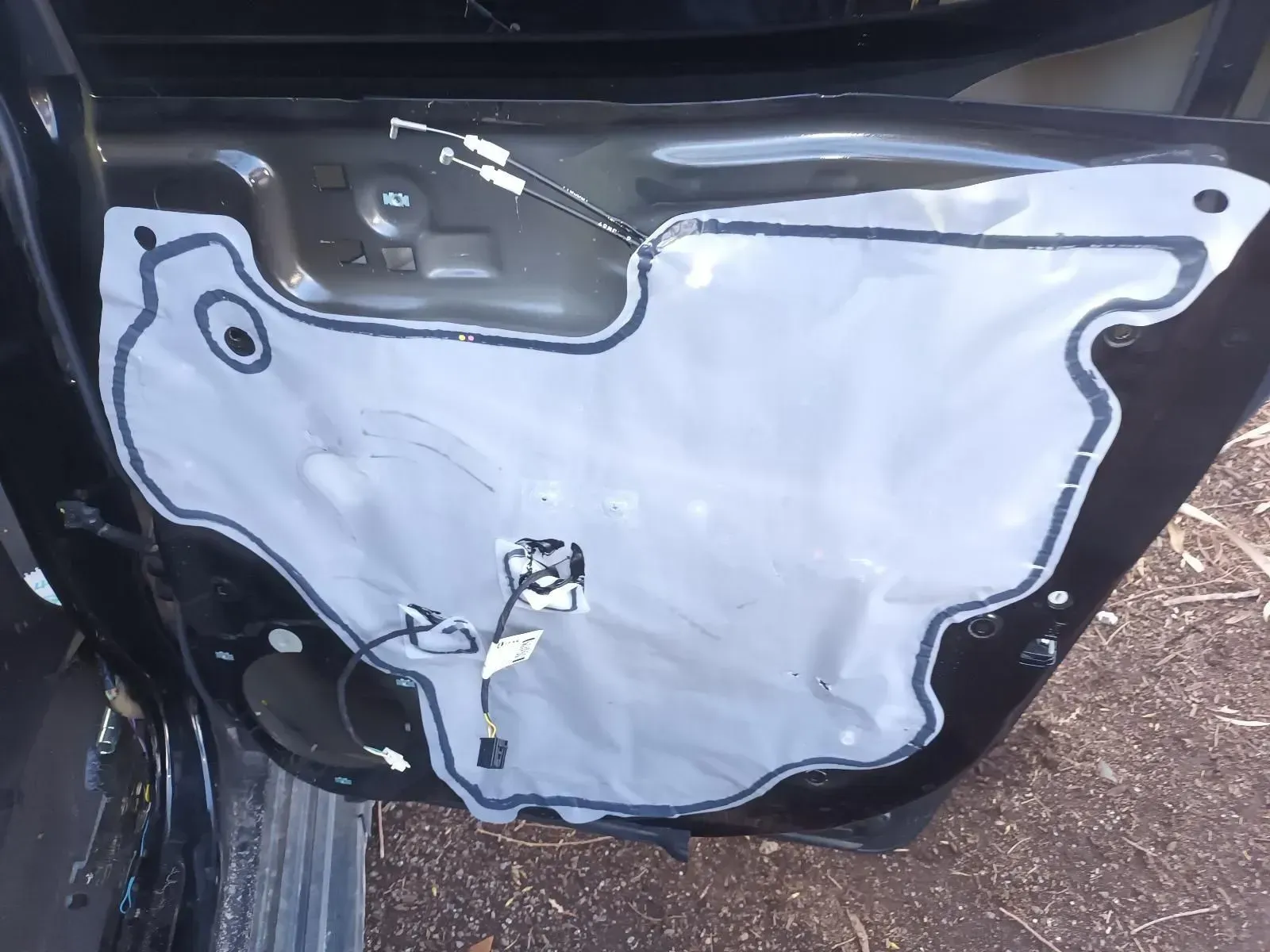 Car Door Frame With Grey Insulation and Wiring — South West 4WD Wreckers In Brisbane, QLD