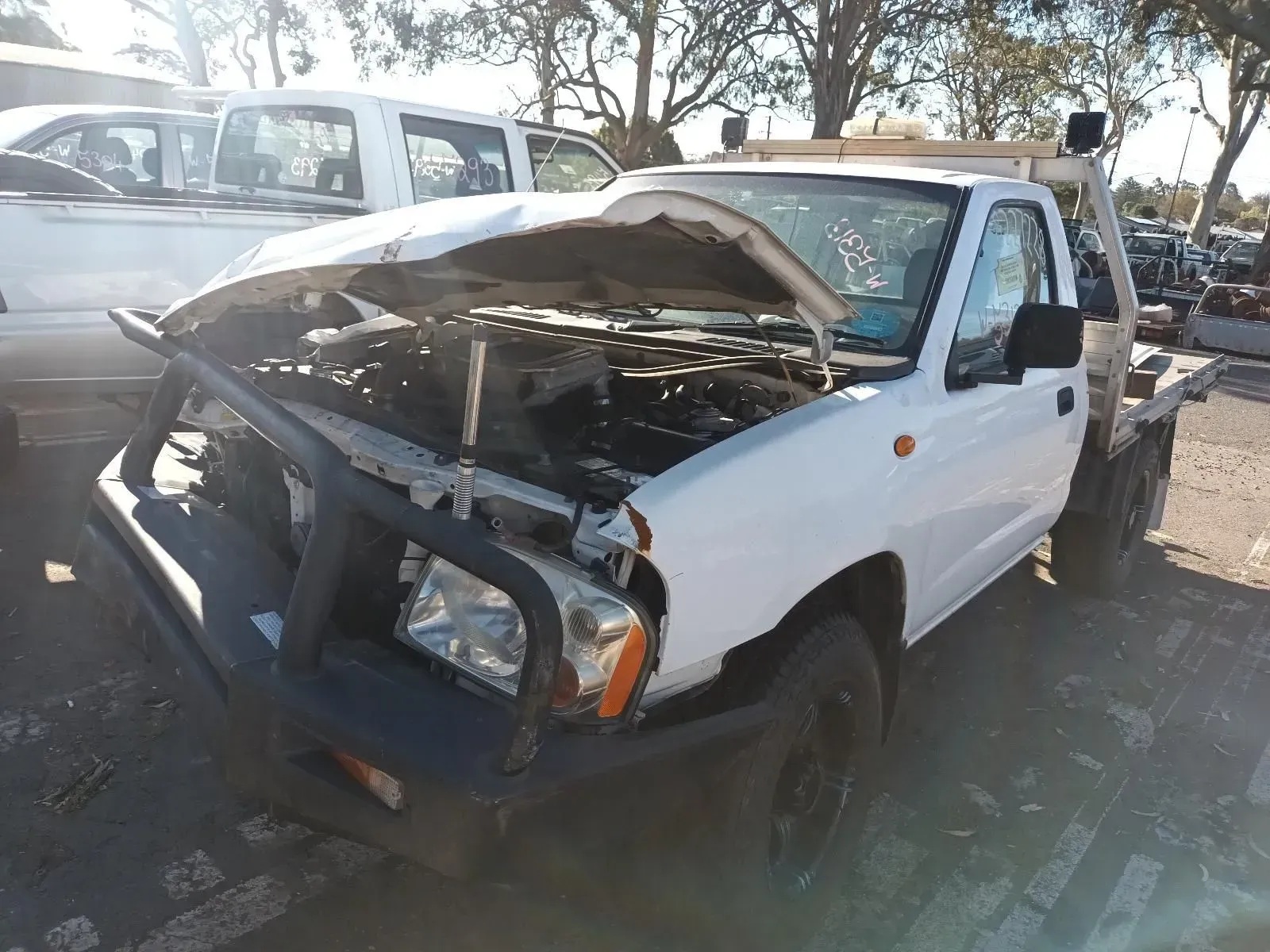 White Pickup Truck Severely Damaged in a Collision — South West 4WD Wreckers In Brisba