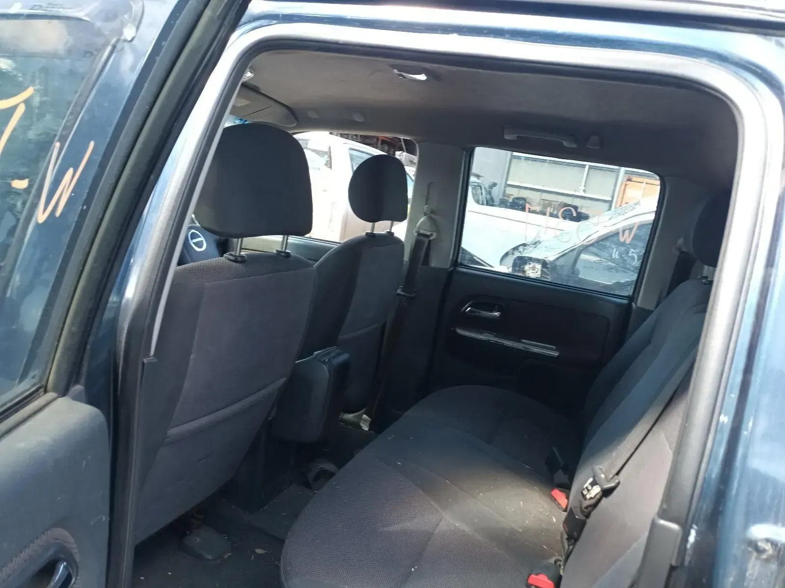 Interior of a Dark Blue Pickup Truck, Showing the Rear Seats and Door — South West 4WD Wreckers In Brisbane, QLD