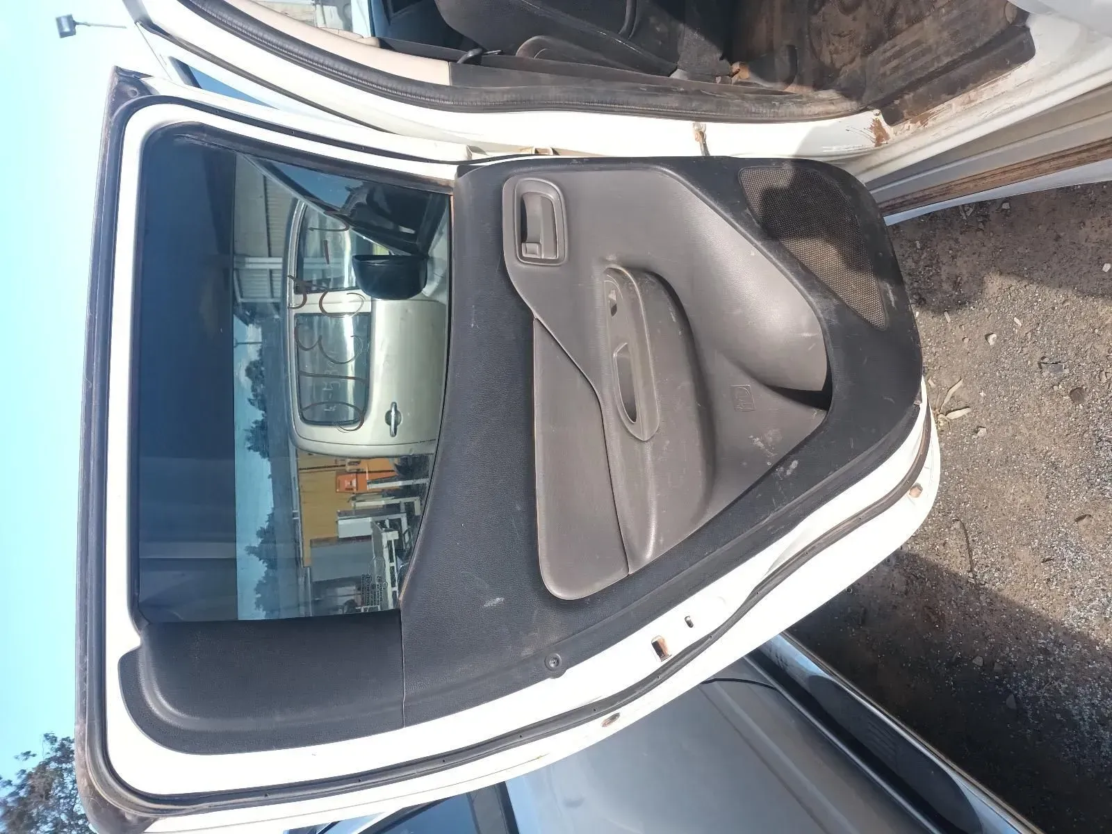 White Truck Door Open, Showing Interior Panel and Window — South West 4WD Wreckers In Brisbane, QLD