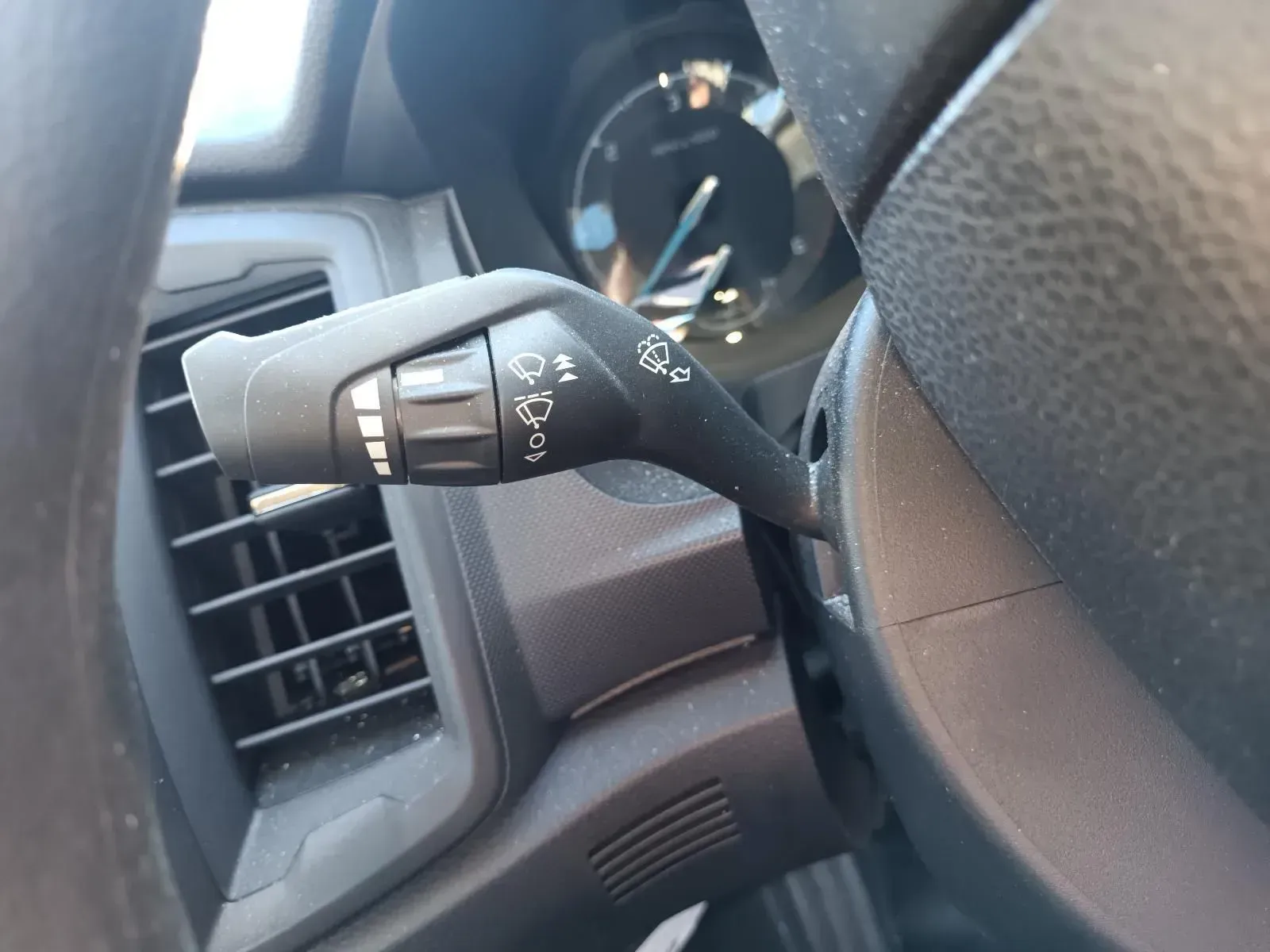 Steering Column With Headlight and Windshield Wiper Controls Inside a Car — South West 4WD Wreckers In Brisbane, QLD
