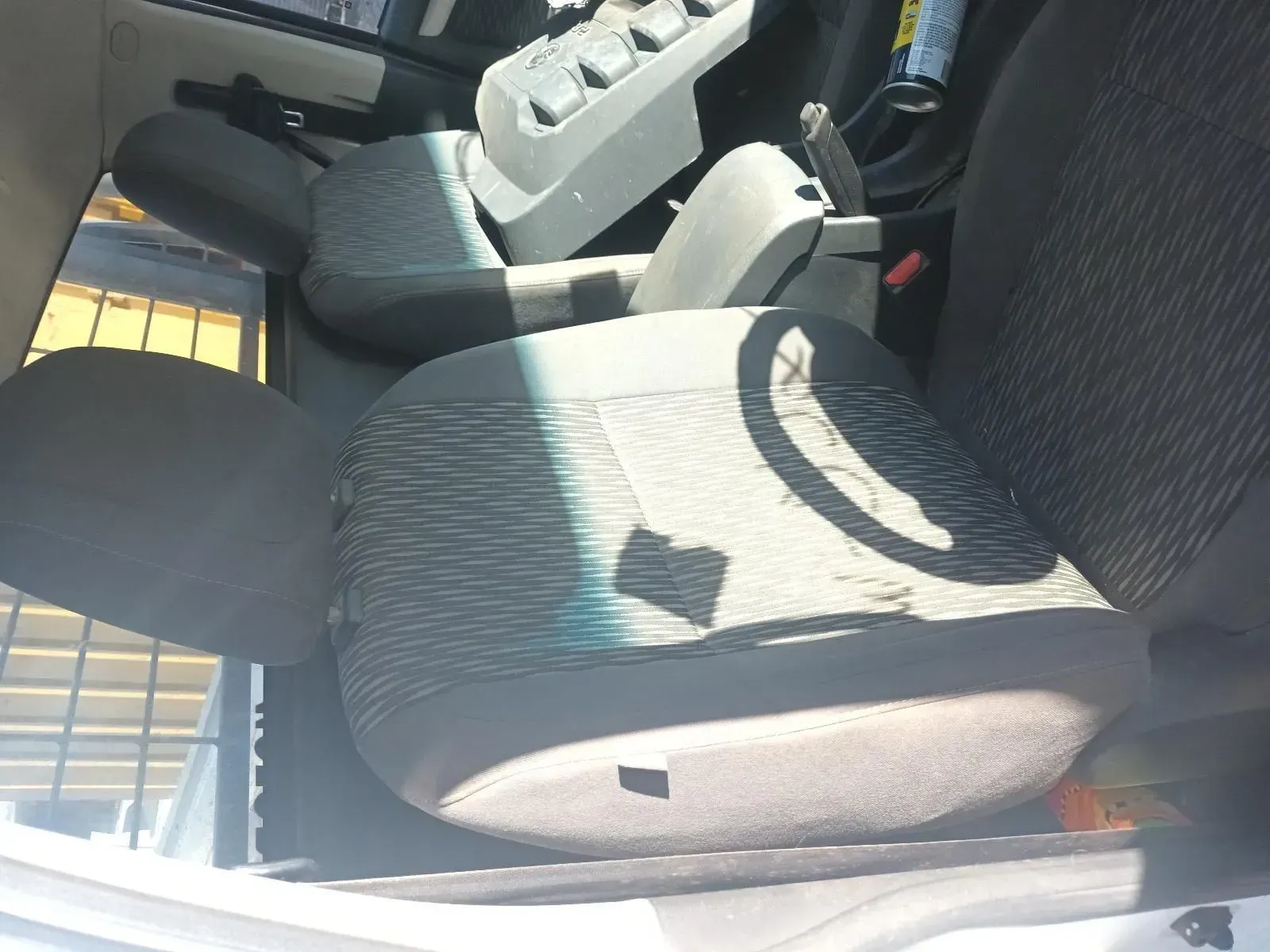 Interior of a Car, Showing a Worn Gray Fabric Seat and Console — South West 4WD Wreckers In Brisbane, QLD