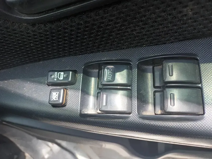 A Close Up of a Car Window Switches — South West 4WD Wreckers In Brisbane, QLD