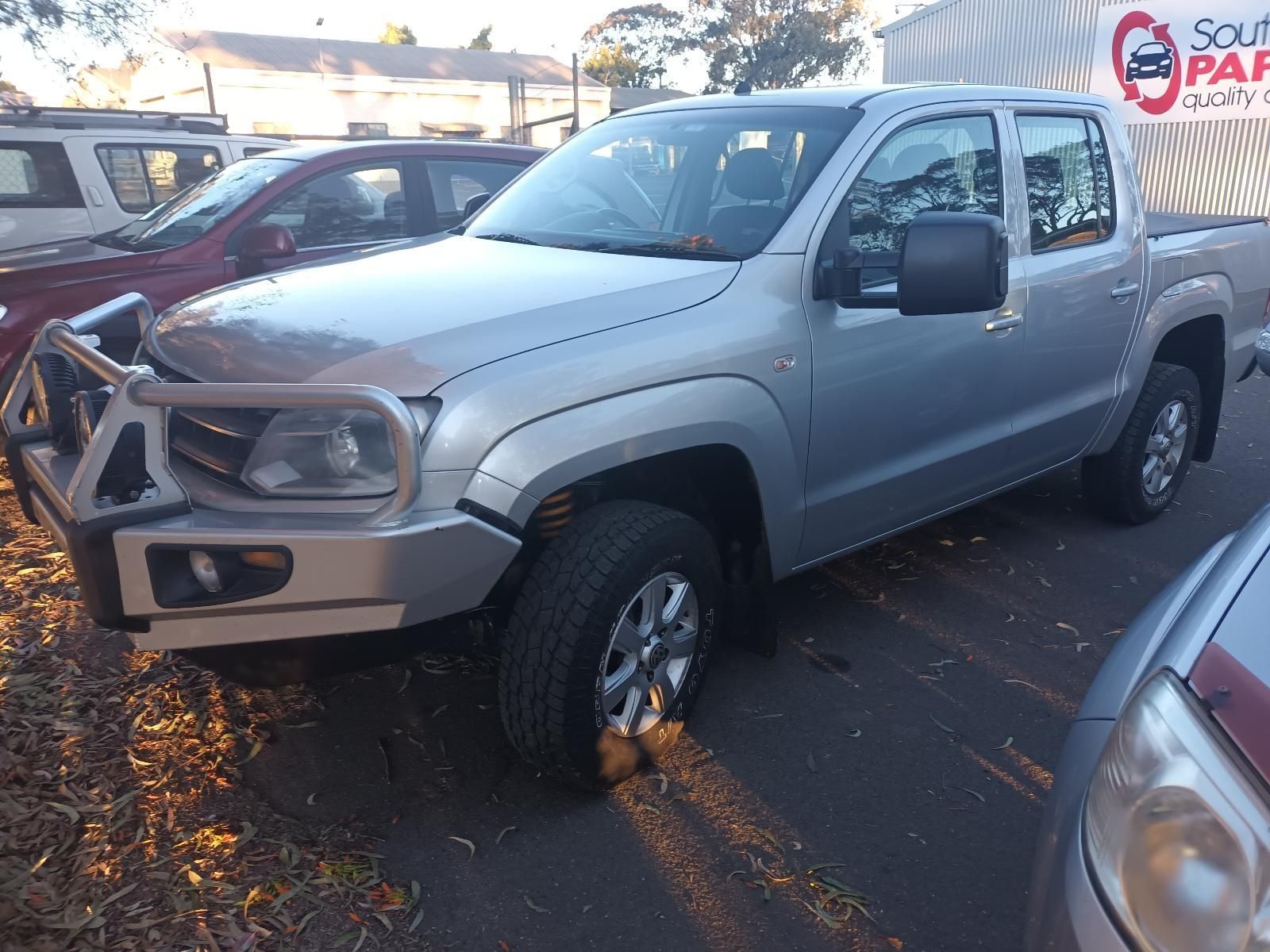 A Silver Suzuki Grand Vitara is Parked in a Driveway — South West 4WD Wreckers In Brisbane, QLD