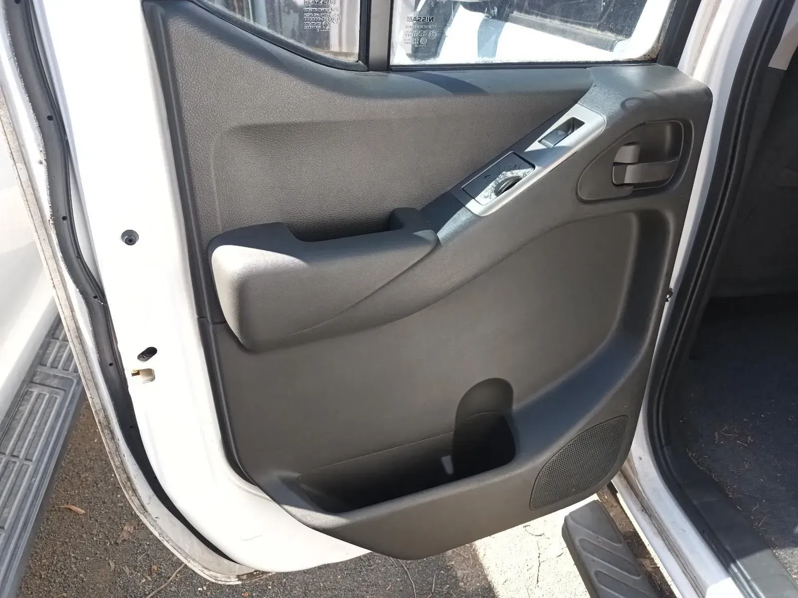 Interior View of a White Car Door Showing the Black Panel — South West 4WD Wreckers In Brisbane, QLD