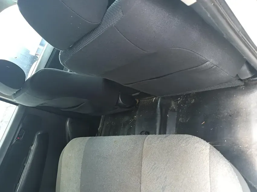 The Back Seat of a Car with a Gray Seat Cover — South West 4WD Wreckers In Brisbane, QLD