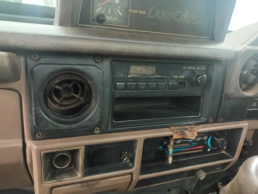 The Dashboard of a Land Cruiser With a Radio and Speakers — South West 4WD Wreckers In Brisbane, QLD