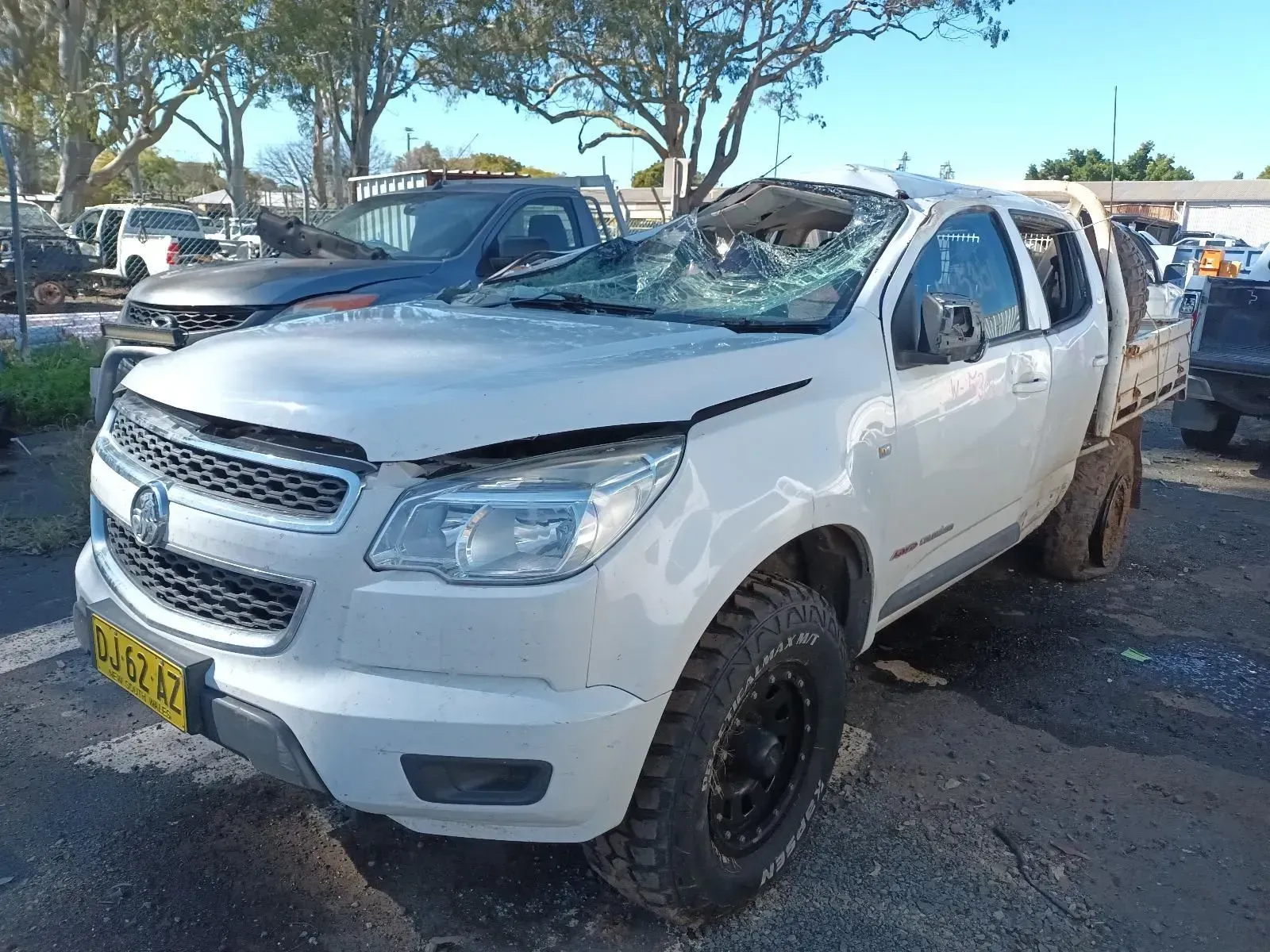 White Pickup Truck With Extensive Windshield Damage — South West 4WD Wreckers In Brisbane, QLD