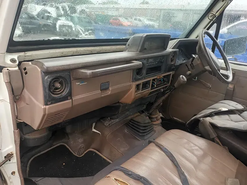 The Interior of a White Truck With Brown Seats and a Dashboard — South West 4WD Wreckers In Brisbane, QLD