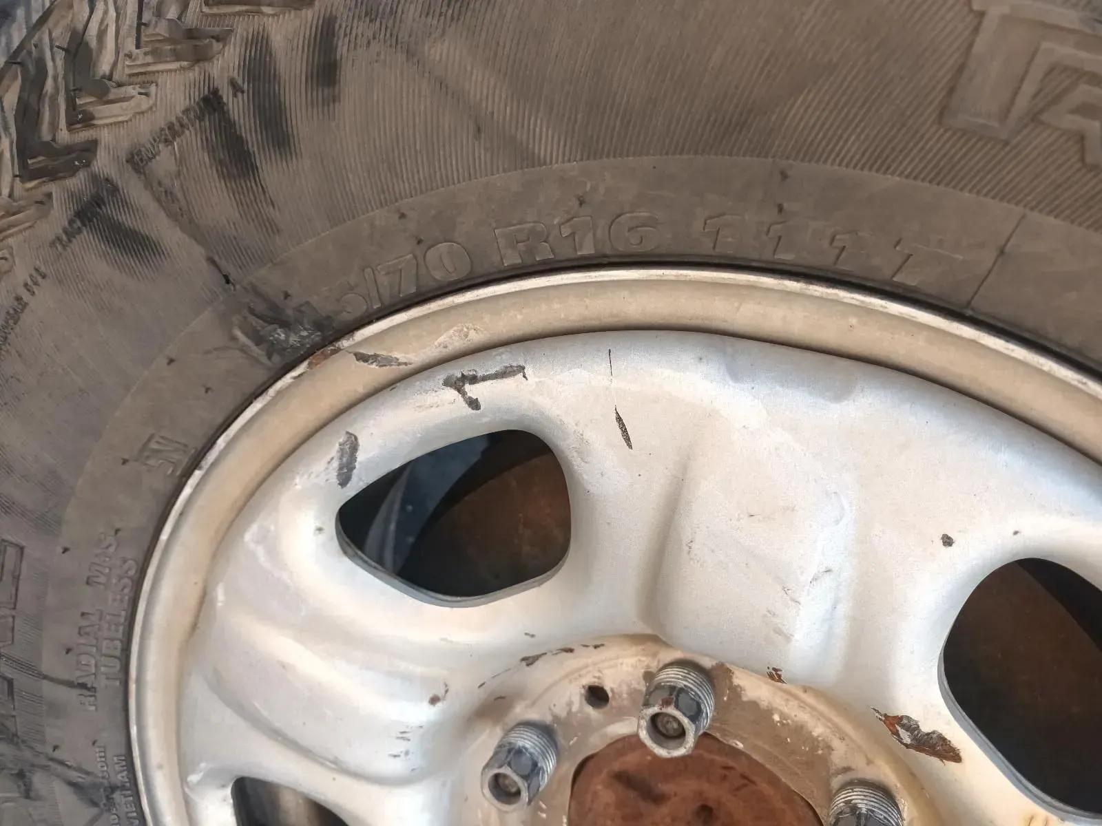 Close-up of a Truck Tyre and Silver Wheel With Scratches — South West 4WD Wreckers In Brisbane, QLD