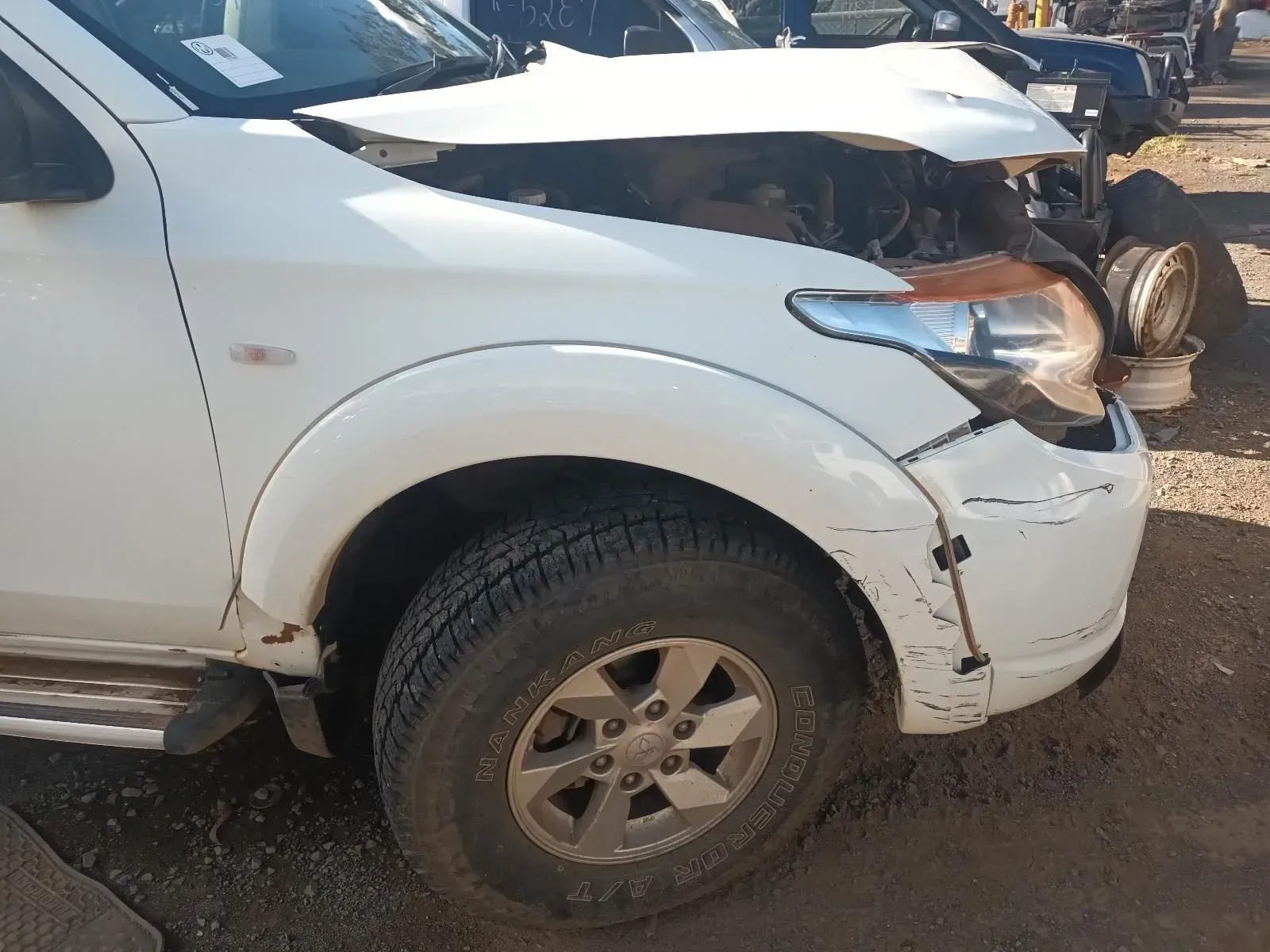 White Pickup Truck With Front-end Damage — South West 4WD Wreckers In Brisbane, QLD