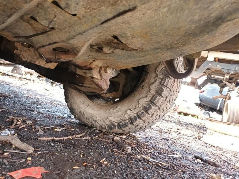 The Underside of a Truck With a Tire That Says Bfgoodrich on It — South West 4WD Wreckers In Harristown, QLD