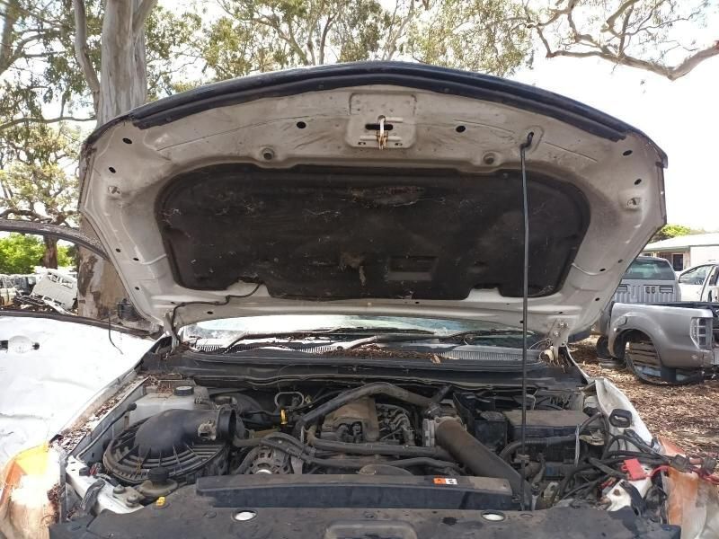 The Hood of a Car is Open and the Engine is Visible — South West 4WD Wreckers In Harristown, QLD
