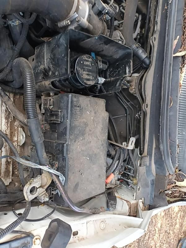 A Close Up of a Car Engine With a Box Underneath It — South West 4WD Wreckers In Harristown, QLD