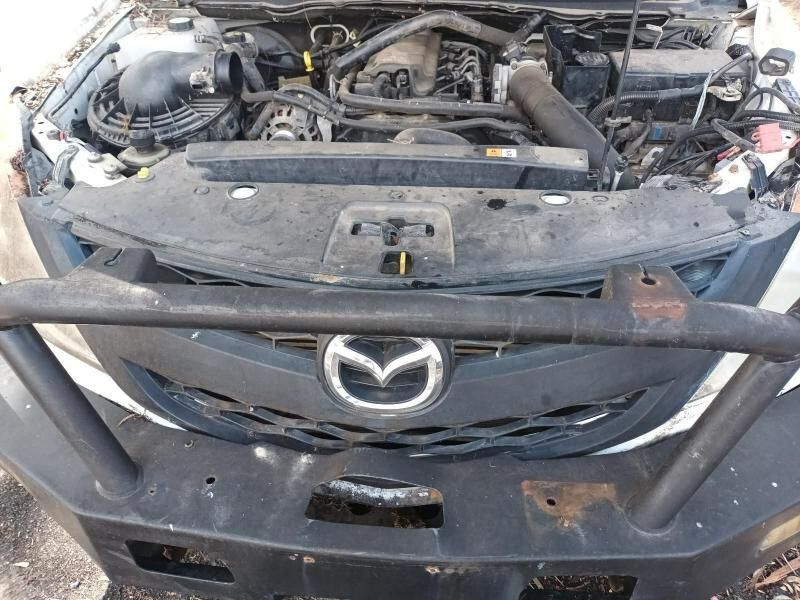 The Front of a Mazda Car With the Hood Open — South West 4WD Wreckers In Harristown, QLD