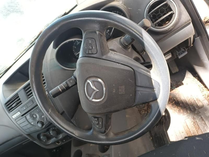 A Steering Wheel With a Mazda Logo on It — South West 4WD Wreckers In Harristown, QLD