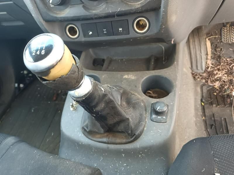 A Dirty Car With a Shifter That Says ' R ' on It — South West 4WD Wreckers In Harristown, QLD