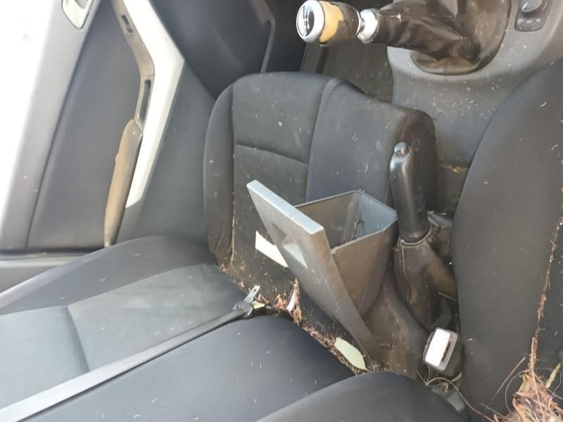 A Dirty Car Seat With a Glove Box in It — South West 4WD Wreckers In Harristown, QLD