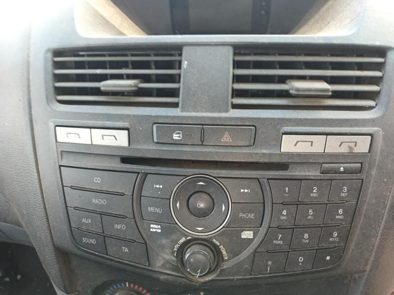 A Close Up of a Car Dashboard With a Radio and Buttons — South West 4WD Wreckers In Harristown, QLD