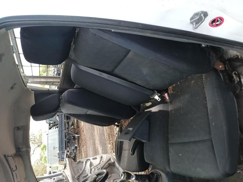 The Back Seat of a White Car With Black Seats — South West 4WD Wreckers In Harristown, QLD