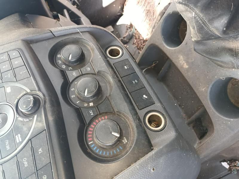 A Close Up of a Car Dashboard With Buttons and Knobs — South West 4WD Wreckers In Harristown, QLD