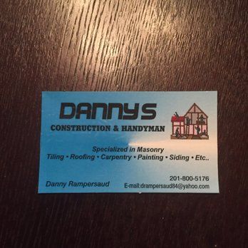 Business card for Danny's Construction & Handyman. Blue, with contact info and a house graphic.