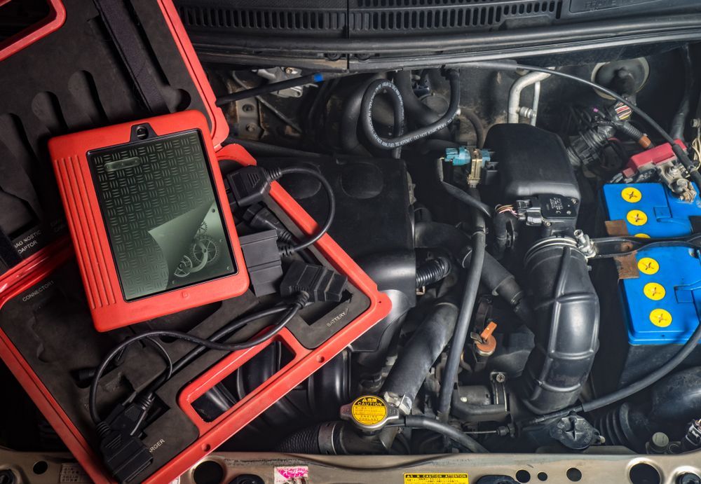 An Open Red Diagnostic Scanner Case Rests — O'Toole Automotive In Tuggerah, NSW