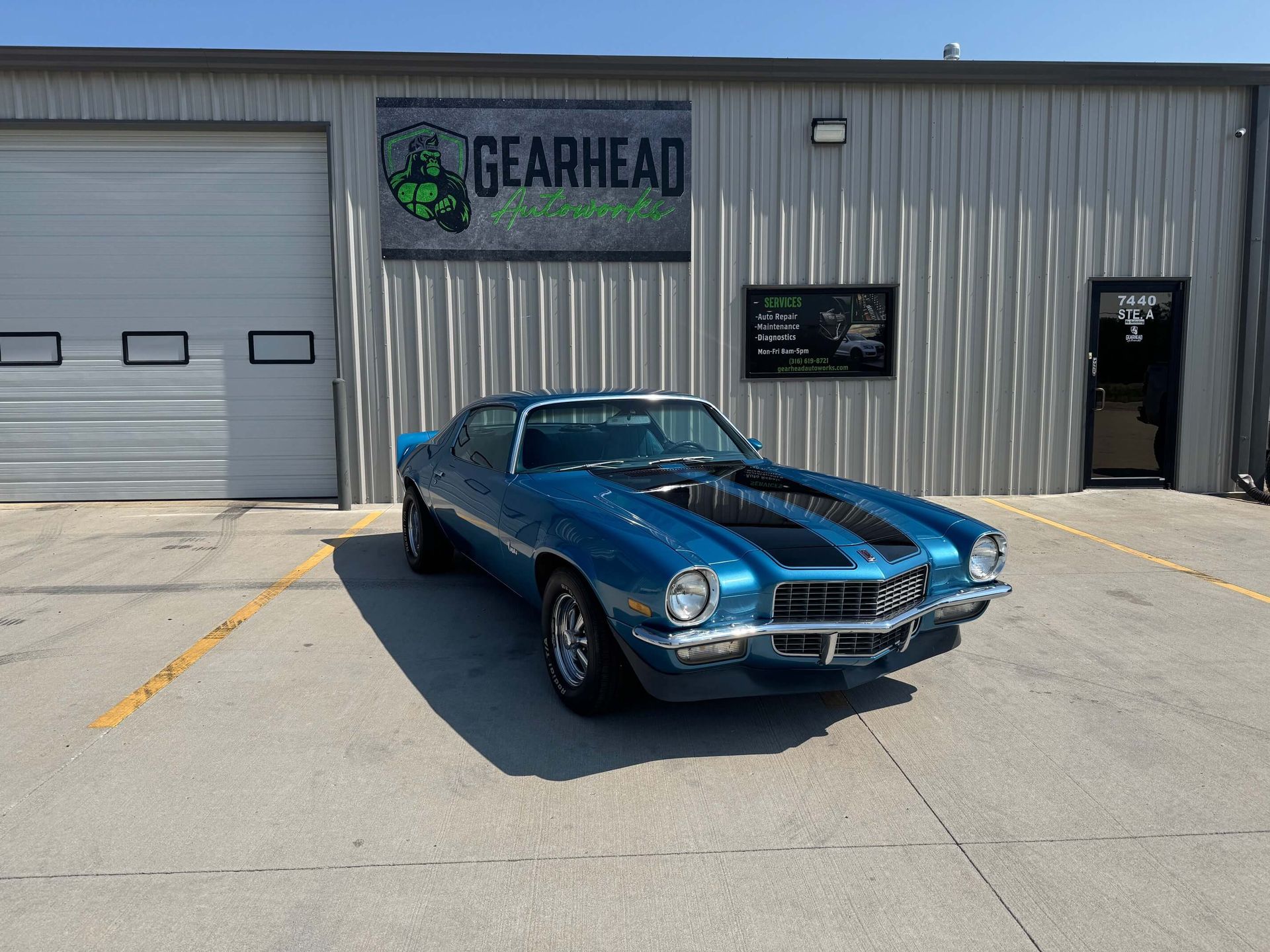 Blue classic car parked in front of the shop | Gearhead Autoworks