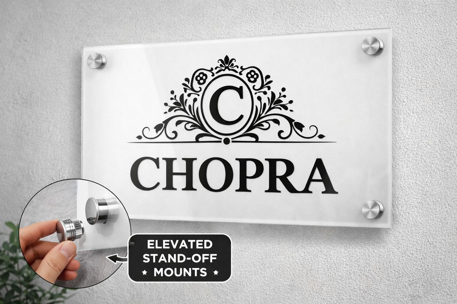 Clear acrylic Chopra family nameplate with decorative crest and elevated stand-off mounts.