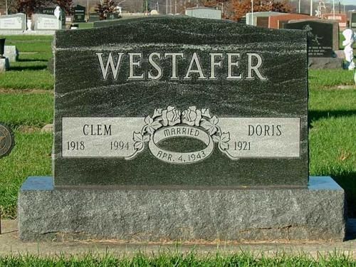 A gravestone for westafer in a cemetery