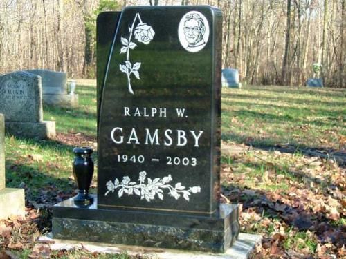 A gravestone for ralph w. gamsby in a cemetery
