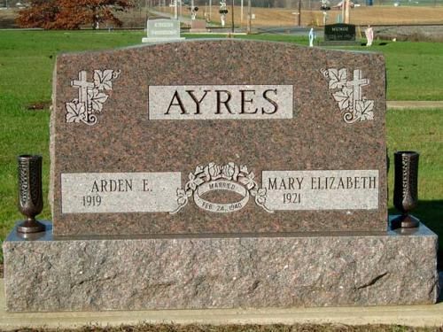 A gravestone for ayres and mary elizabeth in a cemetery