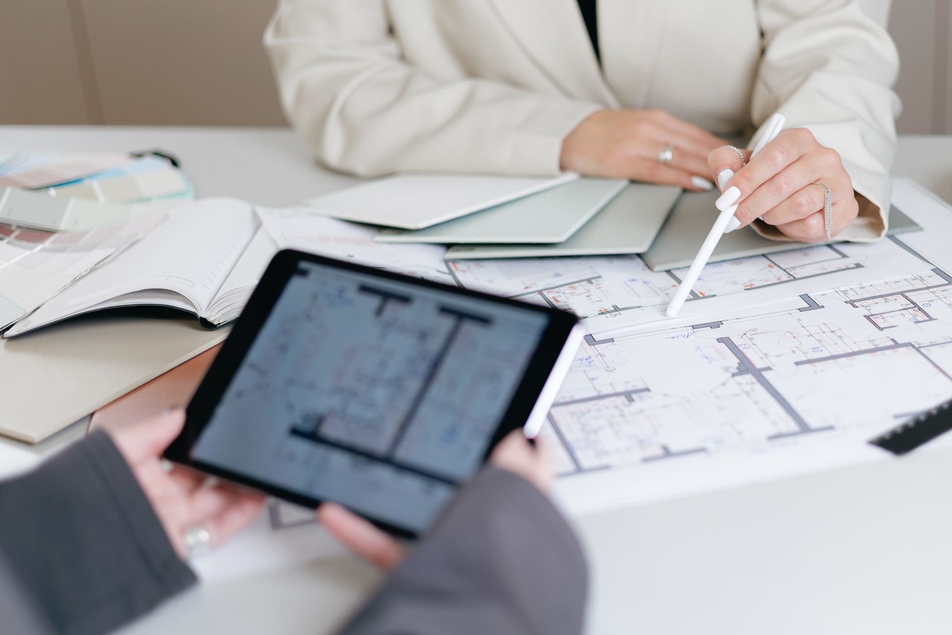 Two People Reviewing Architectural Plans — GS Design & Drafting In Lismore, NSW