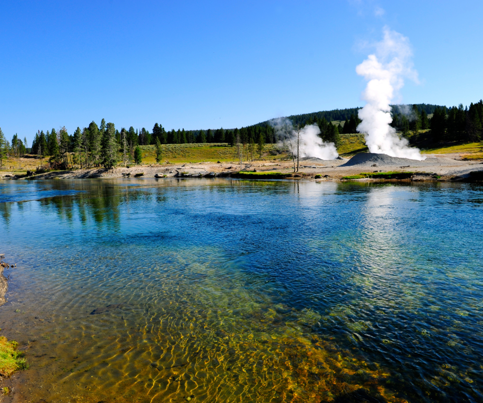 A lake with a geyser coming out of it