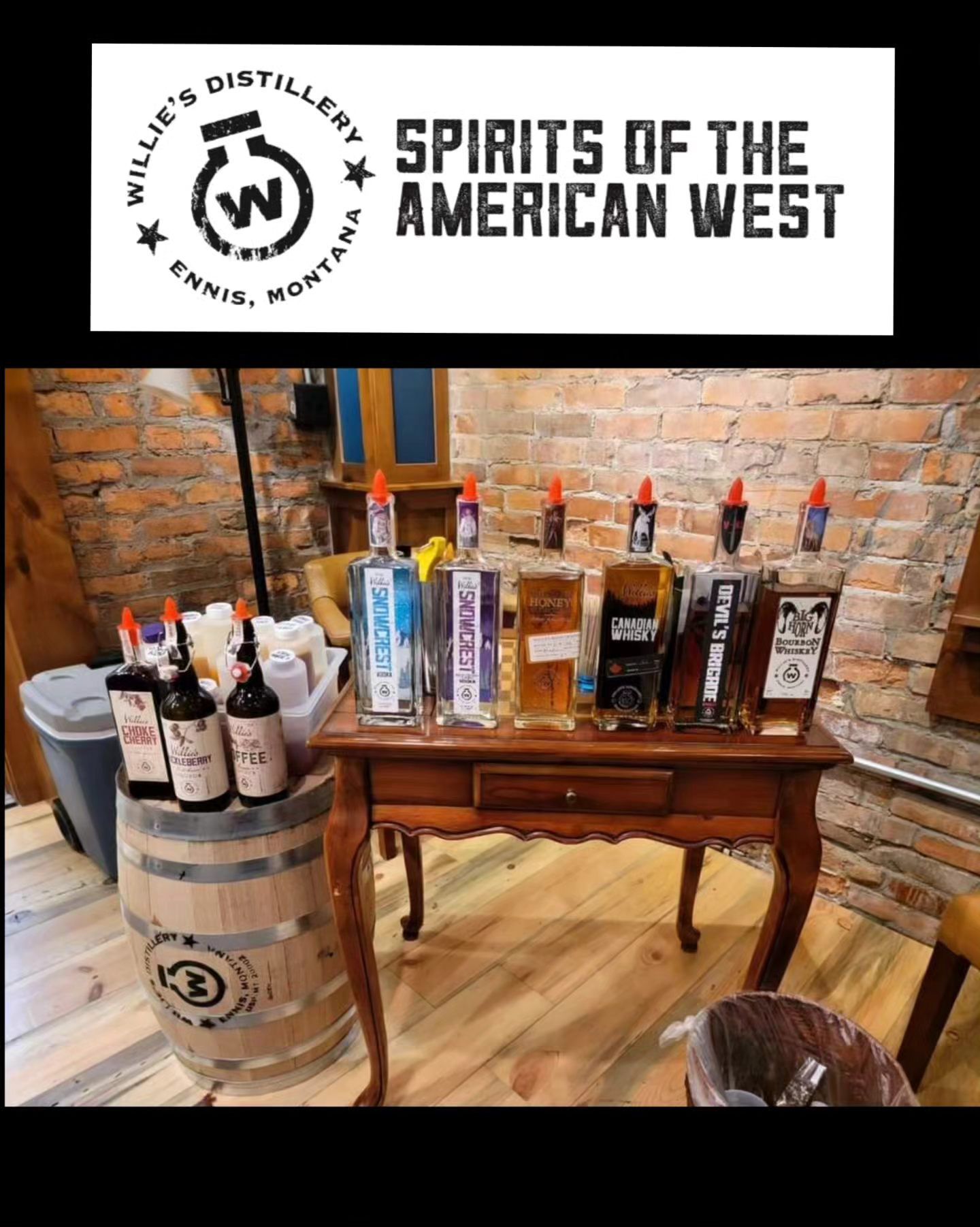 A table with bottles of alcohol on it and a sign that says spirits of the american west