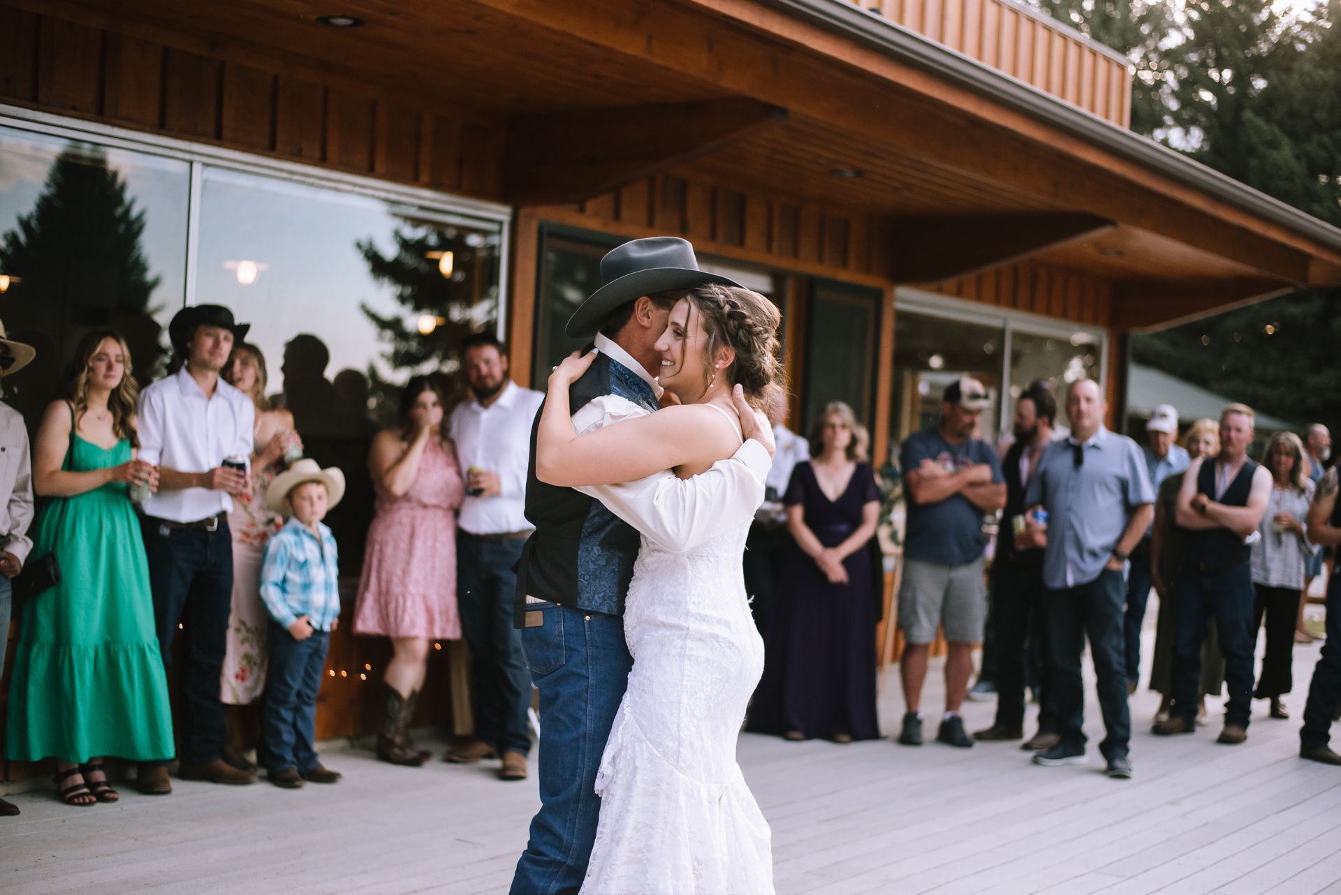 Bride and father dance in front of El Western Conference Center 