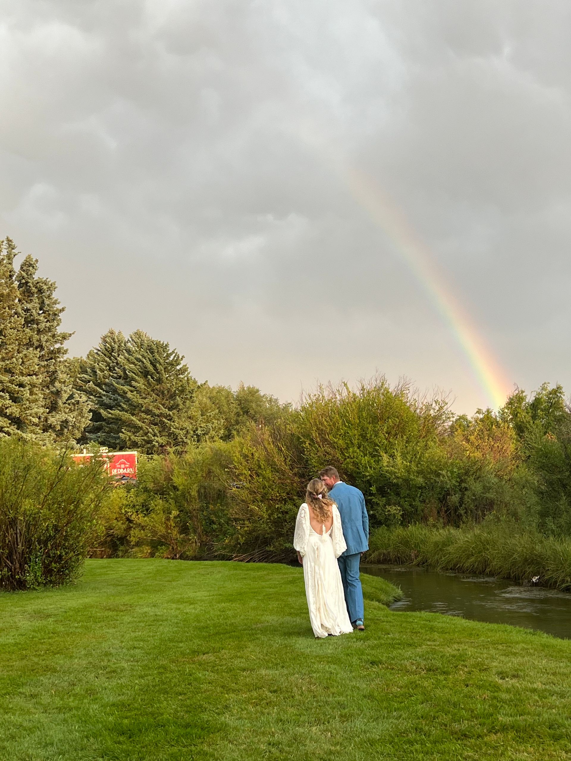 Bride and Groom infant of creek