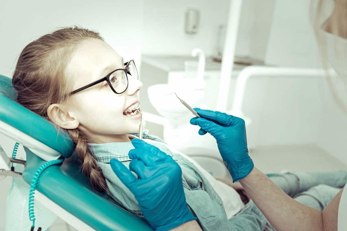 Photo of a child at the dentist