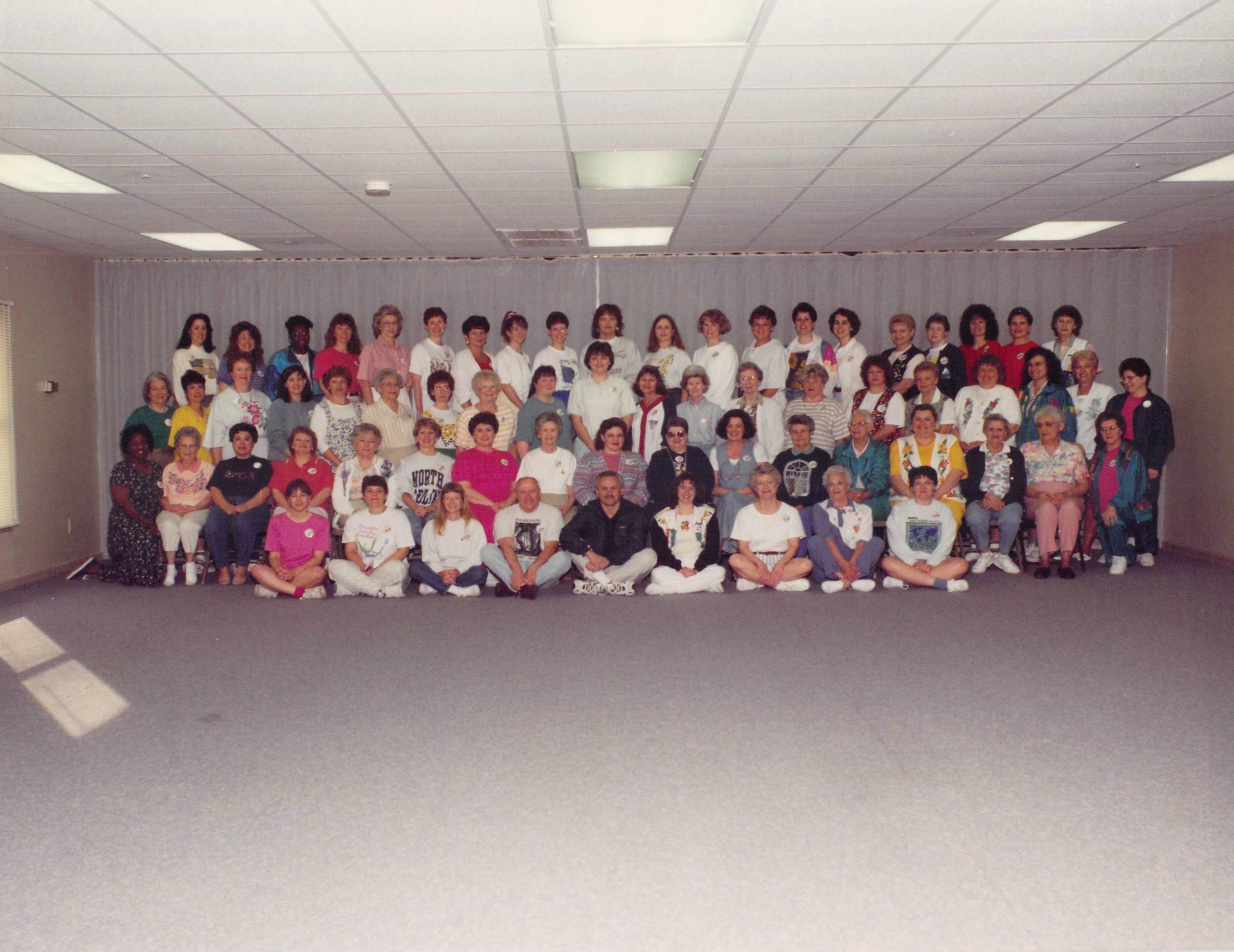 A large group of people are posing for a picture