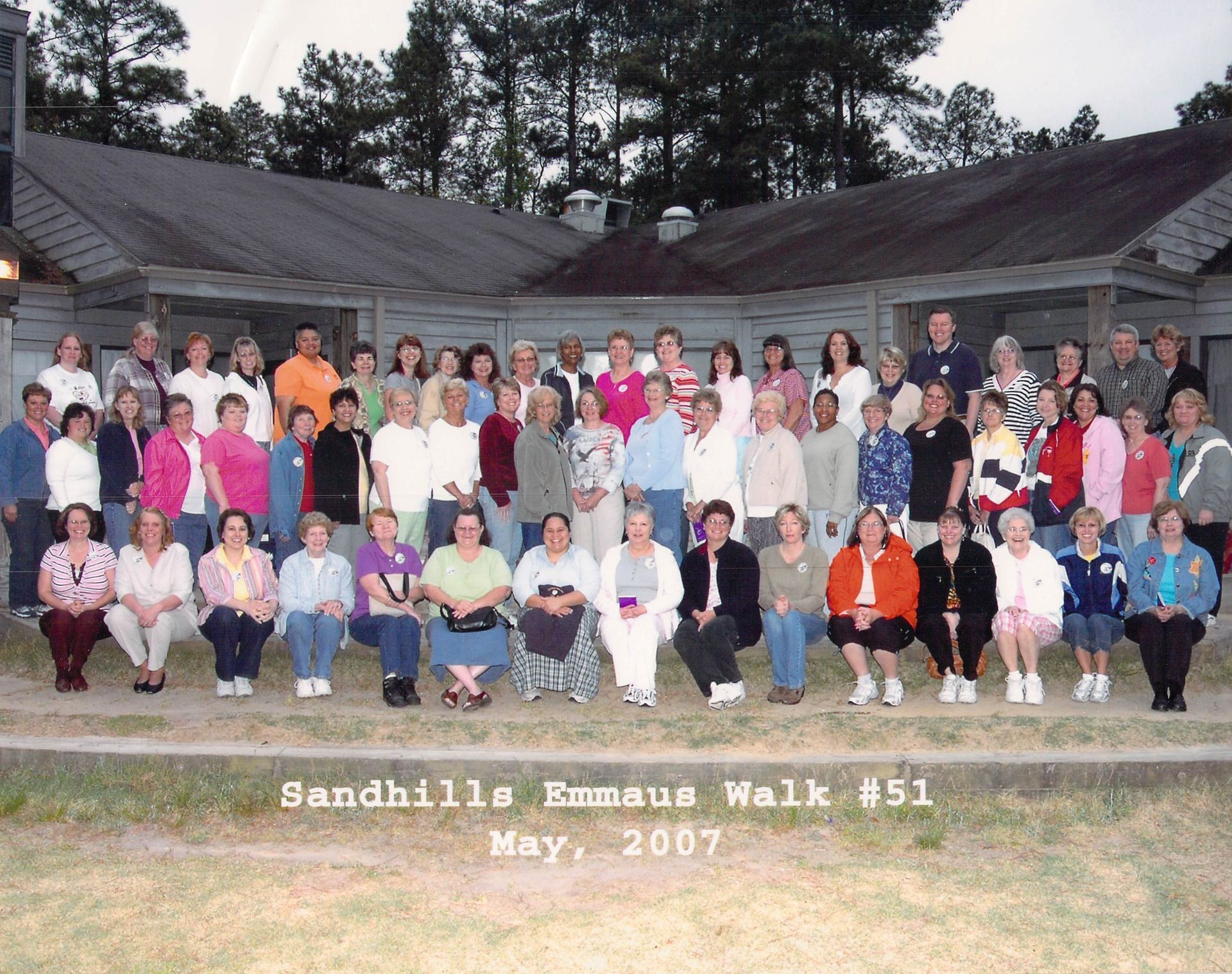 A large group of people pose for a photo at sandhills emmaus walk # 51