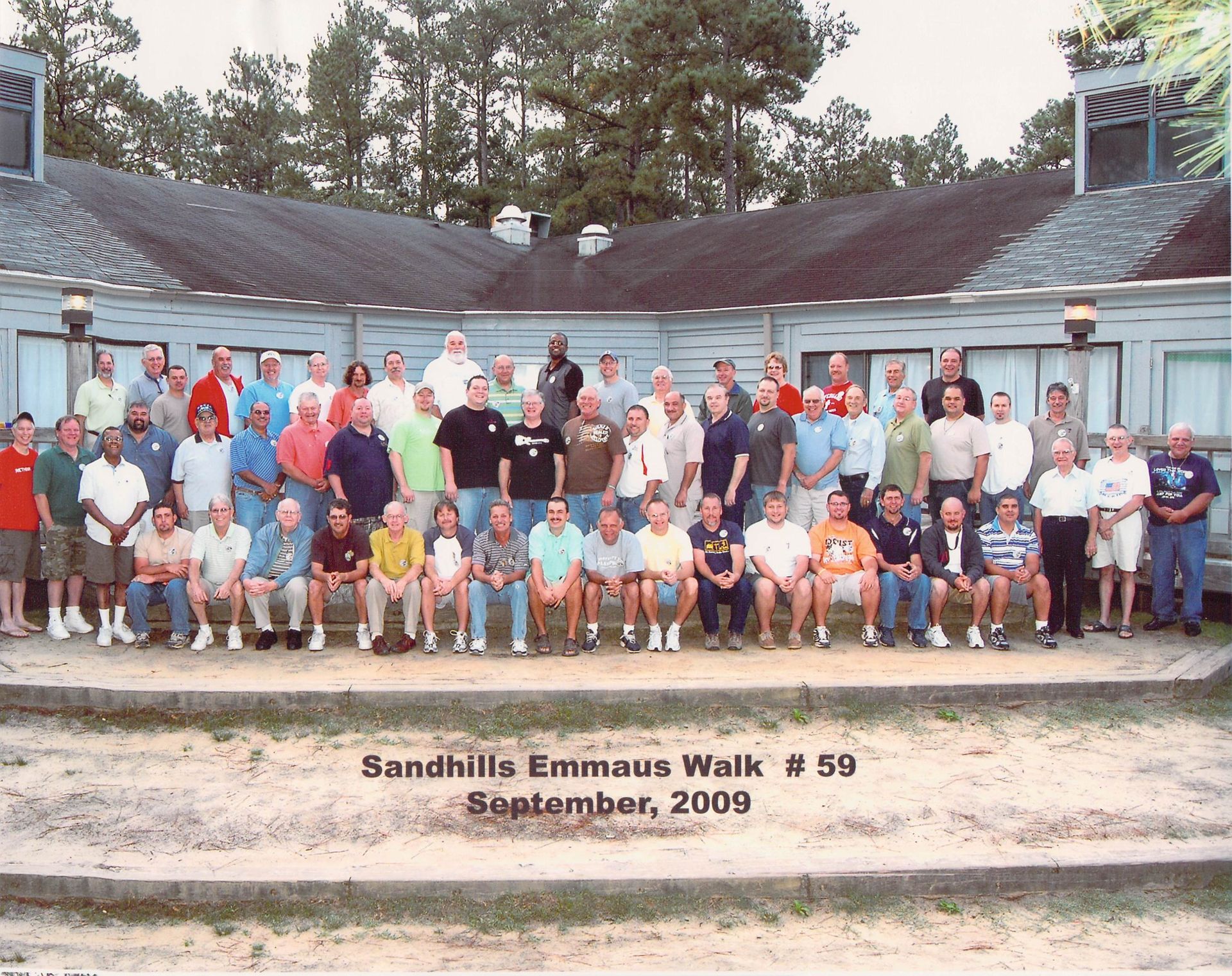 A group of men are posing for a photo at sandhills emmaus walk # 59