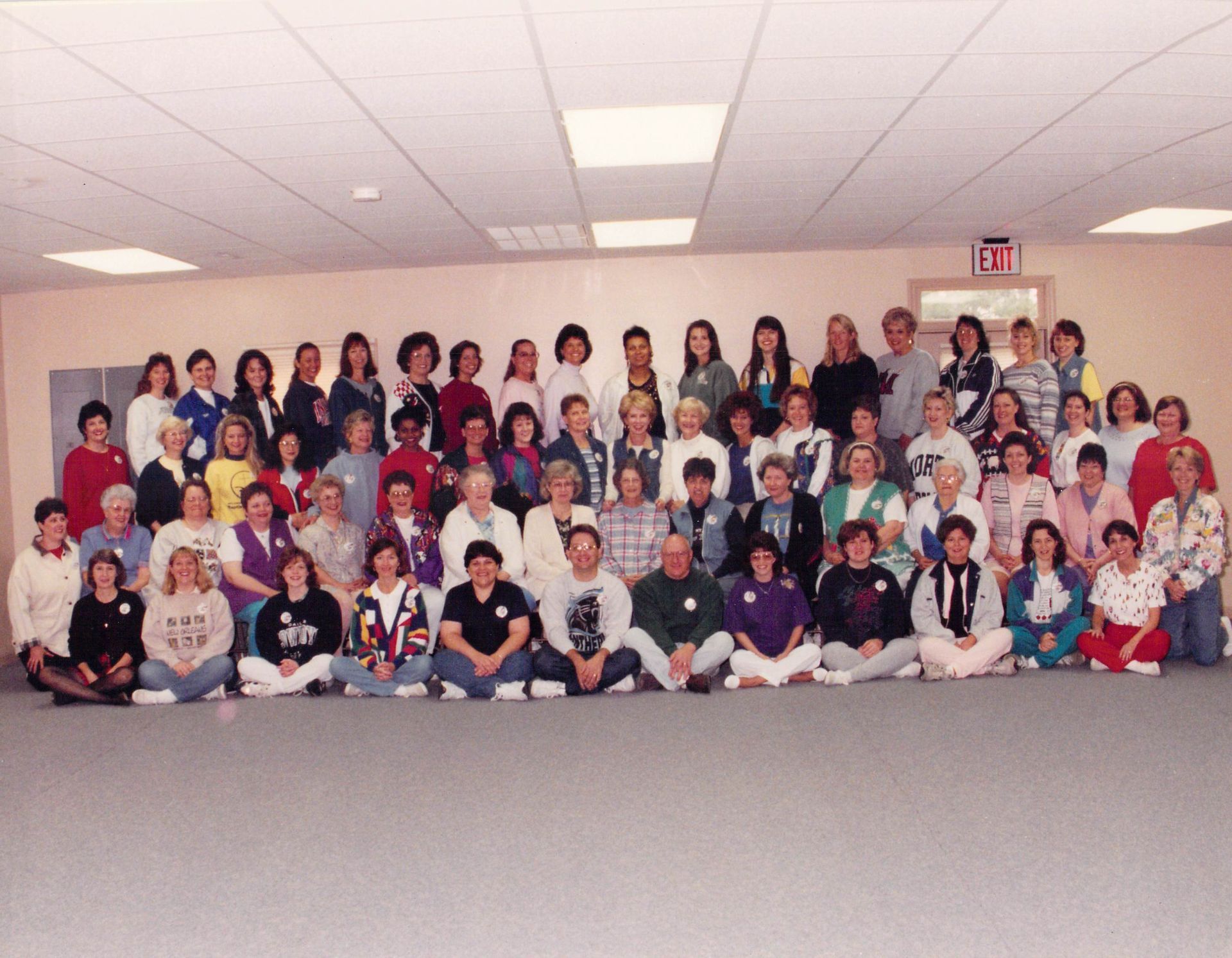 A large group of people are posing for a picture