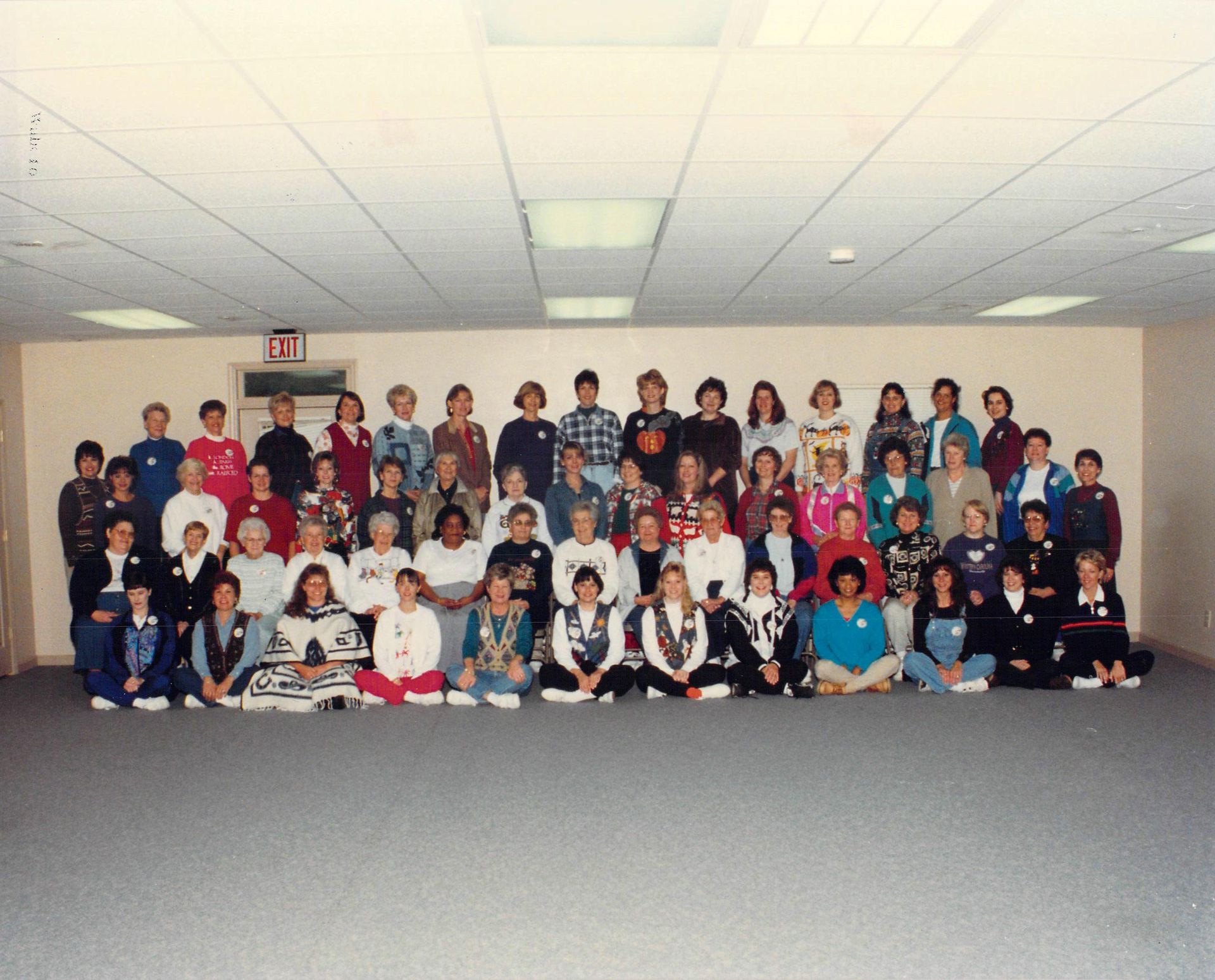 A large group of people are posing for a picture