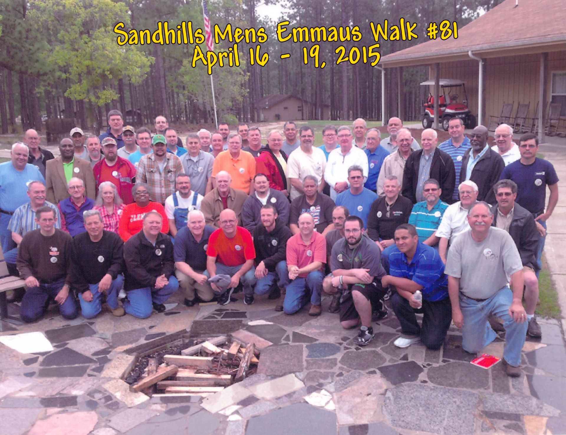 A group of men are posing for a photo at sandhills men 's emmanuel walk # 81