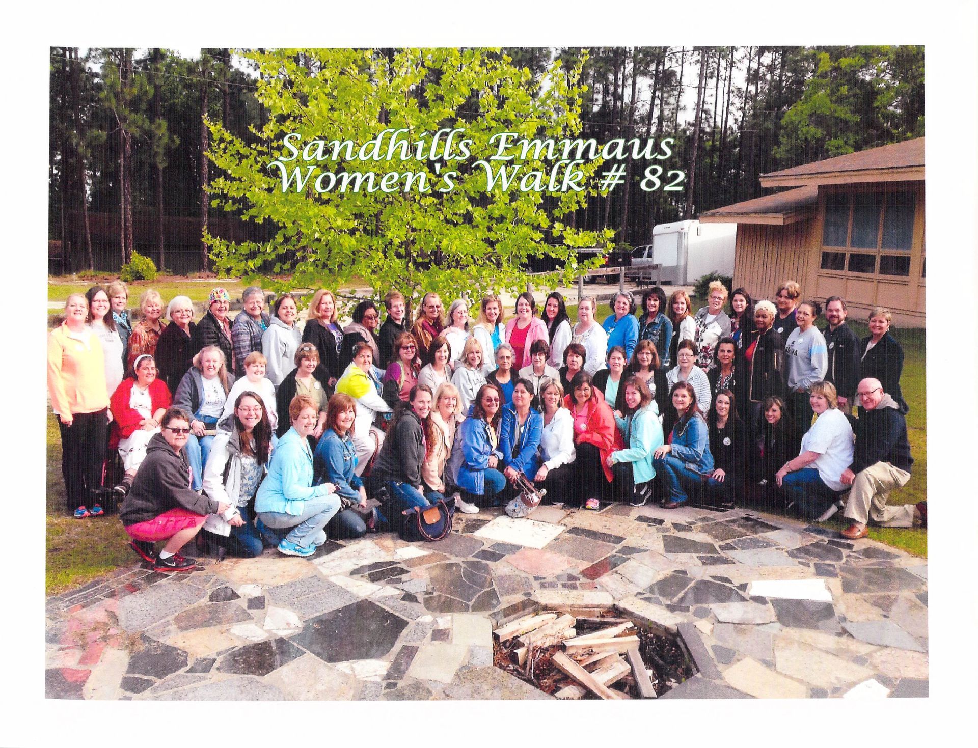 A large group of people are posing for a picture.