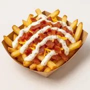 Fries in a cardboard container, topped with bacon, cheese, and a creamy white sauce.