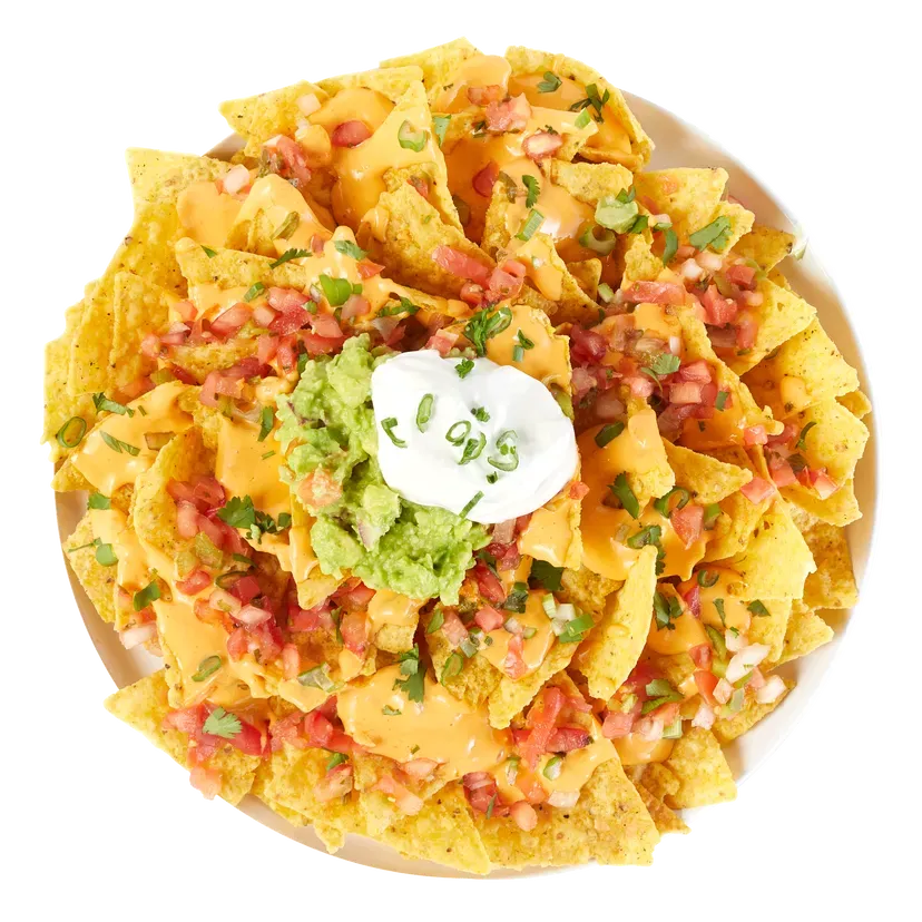 Nachos with cheese, salsa, guacamole, and sour cream.